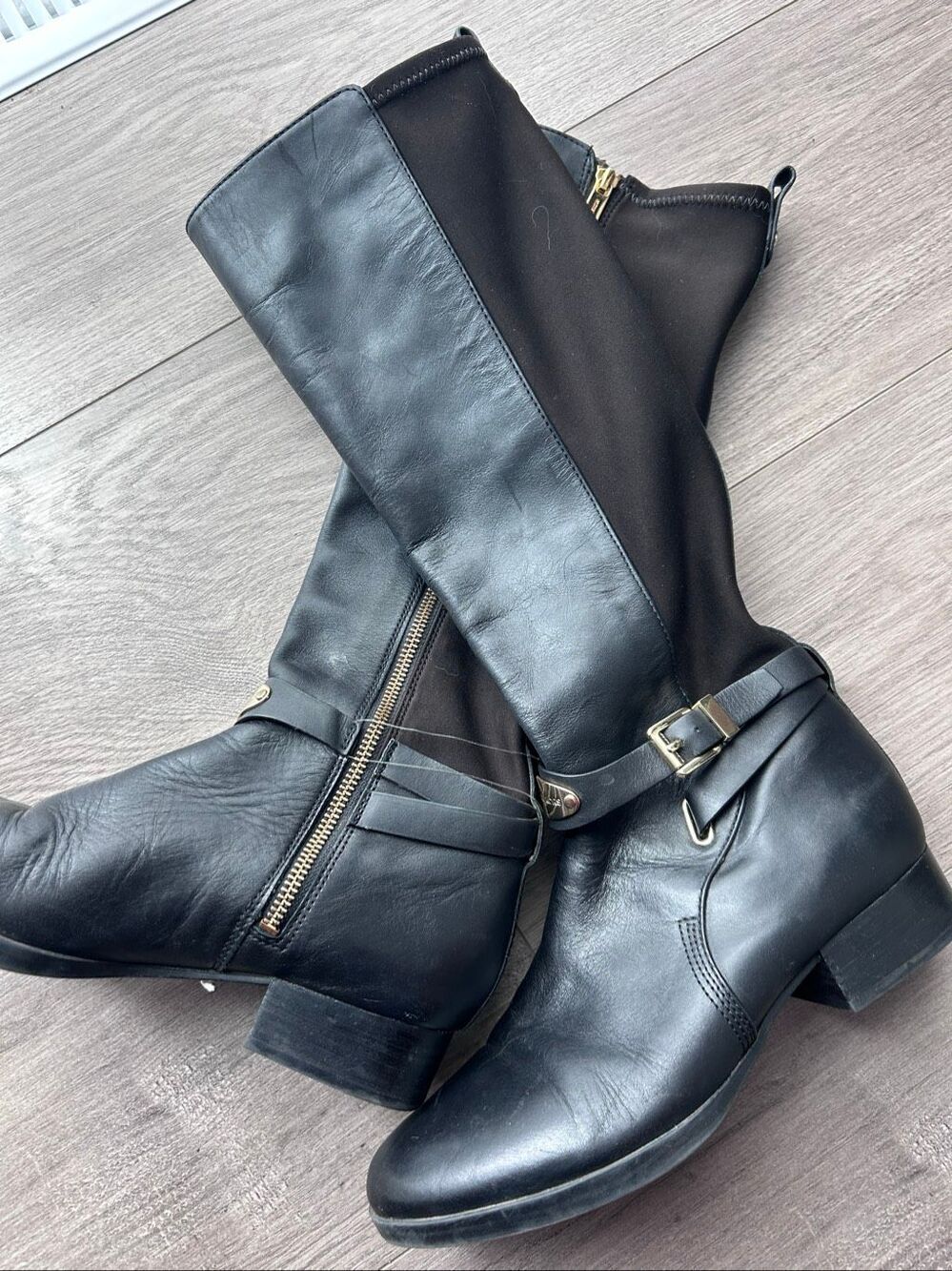 Michael Kors black riding boots with stretchy material in the back size 8.5 leat